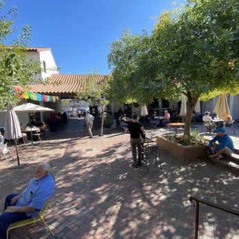 Seis Kitchen - Courtyard where tables are to eat Seis delicious foods and drinks. Other shops here are also delightful. - Mexican Near Me - Tucson, Arizona Seis Kitchen - Courtyard where tables are to eat Seis delicious foods and drinks. Other shops here are also delightful. - Mexican Near Me - Tucson, Arizona