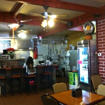 Casa Del Mole - View of the kitchen from the dining room - Mexican Near Me - Healdsburg, California Casa Del Mole - View of the kitchen from the dining room - Mexican Near Me - Healdsburg, California