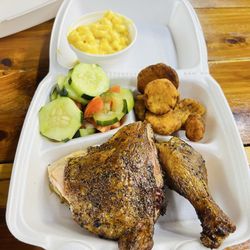 Lockhart Chisholm Trail BBQ - Bbq chicken with Mac and cheese, tomato and cucumber salad, an fried squash.