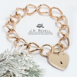 Revell Jewelers - Handmade gold large link bracelet with padlock closure.