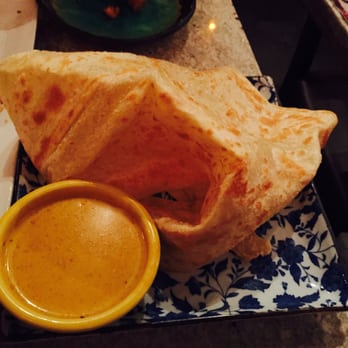 Laut - Roti Canai- the chicken curry sauce was rich and flavorful that my friend finished his with rice. - Thai Near Me - New York, New York Laut - Roti Canai- the chicken curry sauce was rich and flavorful that my friend finished his with rice. - Thai Near Me - New York, New York