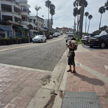 San Clemente Pier - Lady with her cat. - Beaches Near Me - San Clemente, California San Clemente Pier - Lady with her cat. - Beaches Near Me - San Clemente, California