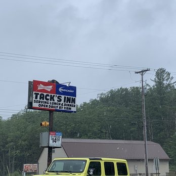 Tack's Inn - a yellow jeep parked in front of a building - American Near Me - Lewis Run, Pennsylvania Tack's Inn - a yellow jeep parked in front of a building - American Near Me - Lewis Run, Pennsylvania