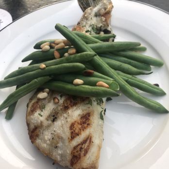 Supper - Grilled Whole Bronzino with green beans minus lemon garlic sauce. - New American Near Me - San Antonio, Texas Supper - Grilled Whole Bronzino with green beans minus lemon garlic sauce. - New American Near Me - San Antonio, Texas