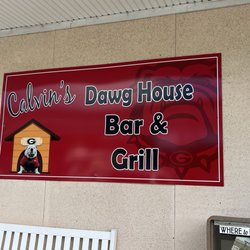 Calvin's Dawghouse Bar & Grill - Exterior - actually shares building with a convenience store