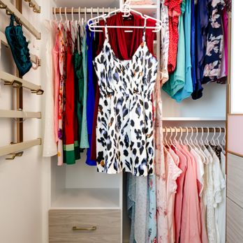 California Closets - Small walk-in closet with plenty of hanging and a wall-mounted organizer - California Closets in Vancouver, BC - Interior Design Near Me - Vancouver, British Columbia California Closets - Small walk-in closet with plenty of hanging and a wall-mounted organizer - California Closets in Vancouver, BC - Interior Design Near Me - Vancouver, British Columbia