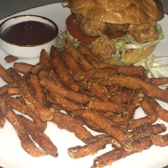 Cured Table & Tap - Nashville hot fried chicken sandwich with sweet potato fries - American Near Me - Columbia, Maryland