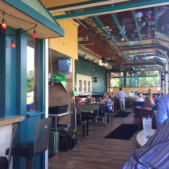 Silver Beach Pizza - Outdoor seating. Bar on left. - Pizza Near Me - Saint Joseph, Michigan