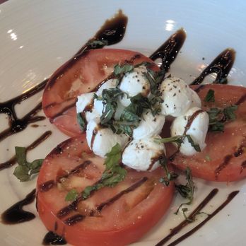 Amici Pizzeria & Bar - House made mozzarella caprese salad - Pizza Near Me - Reno, Nevada Amici Pizzeria & Bar - House made mozzarella caprese salad - Pizza Near Me - Reno, Nevada