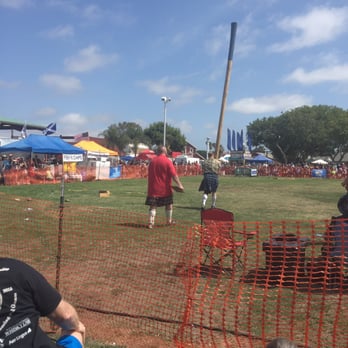 Scottish Fest - Caper Toss at Scottish Fest. Notice the crowd moving, "just in case." - Festivals Near Me - Costa Mesa, California