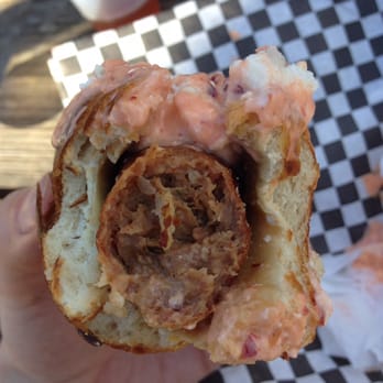 Moon Tower - Cross section of an Elk dog. Topped with sambal mayo, feta, and onion - Dive Bars Near Me - Houston, Texas Moon Tower - Cross section of an Elk dog. Topped with sambal mayo, feta, and onion - Dive Bars Near Me - Houston, Texas