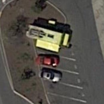 Yellow Food Truck - the intersection of a parking lot - Food Trucks Near Me Yellow Food Truck - the intersection of a parking lot - Food Trucks Near Me