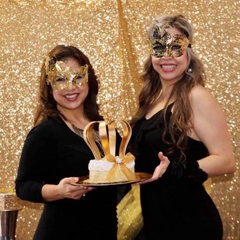 Los Merla Bakery - two women holding a cake - Custom Cakes Near Me - Richardson, Texas