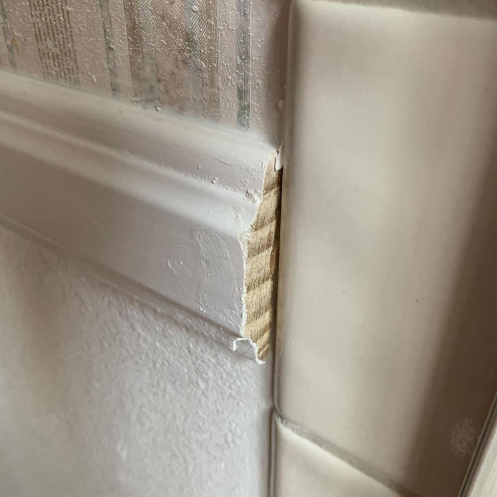 Leak Specialties - This chair molding runs to the shower plus4 inches of tile. Moisture will easily get into unpainted wood. - Plumbing Near Me