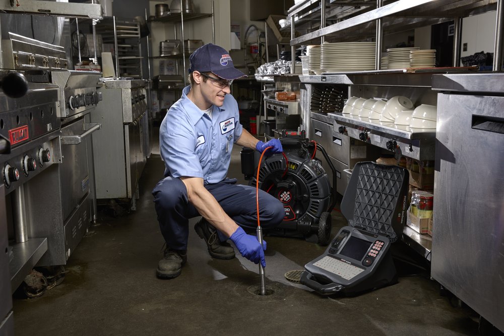 Slide of Roto-Rooter Plumbing, Drain, & Water Cleanup Service BRAN W