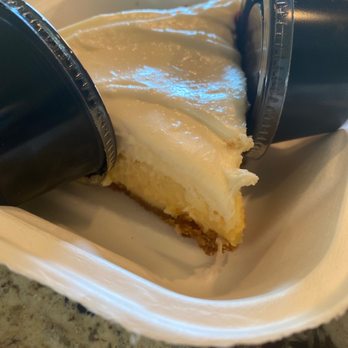 Loula's Cafe - Key Lime pie with Huckleberry drizzle to go. - Breakfast & Brunch Near Me - Whitefish, Montana Loula's Cafe - Key Lime pie with Huckleberry drizzle to go. - Breakfast & Brunch Near Me - Whitefish, Montana