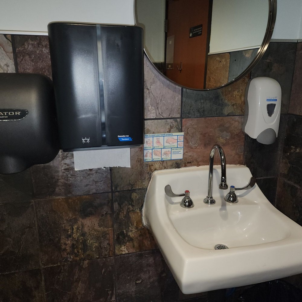 OneTaco - Bathroom with hand washing instructions - Mexican Near Me - Austin, Texas OneTaco - Bathroom with hand washing instructions - Mexican Near Me - Austin, Texas