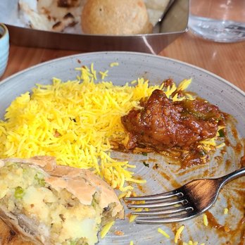 Khazana Indian Express N Pizza - a plate of food - Pizza Near Me - Edmonton, Alberta Khazana Indian Express N Pizza - a plate of food - Pizza Near Me - Edmonton, Alberta