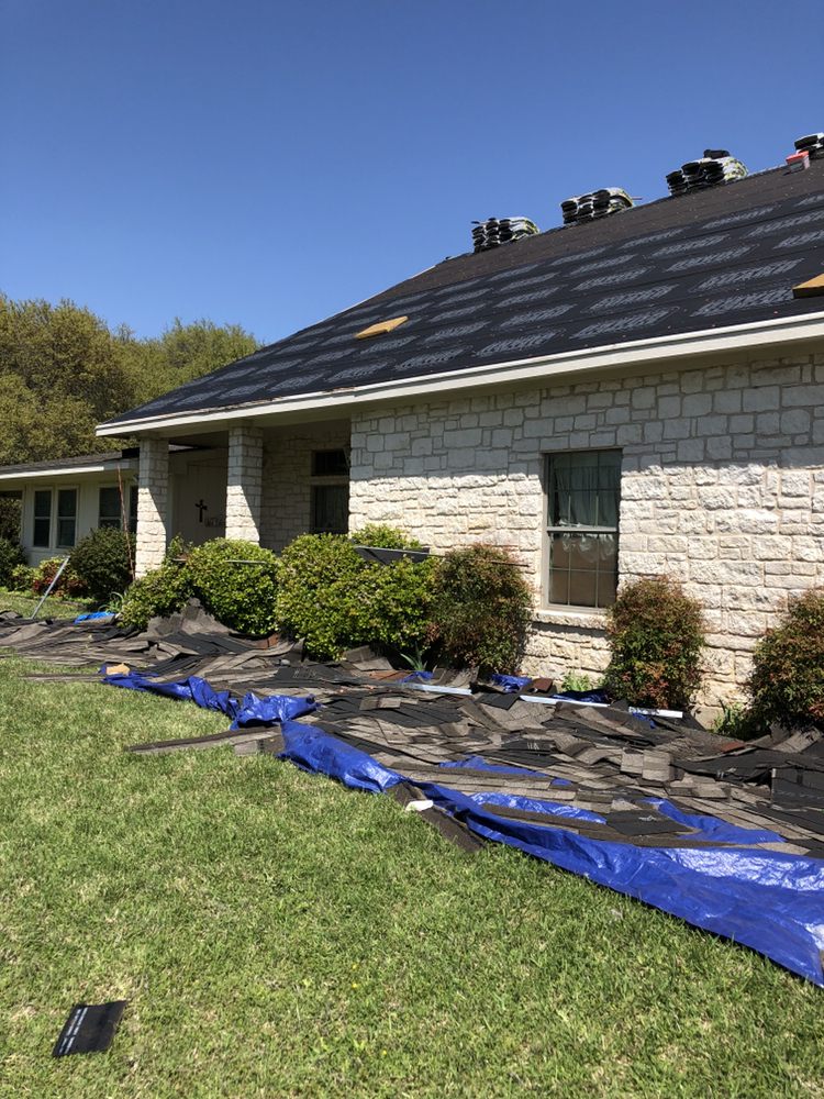 Slide of Erik's Roofing