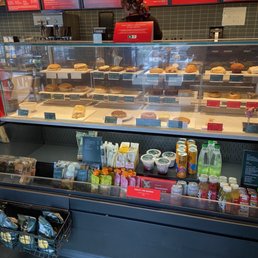 a display of coffee and pastries a display of coffee and pastries