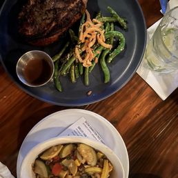 Pork chop for one with miso green beans. Pork chop for one with miso green beans.