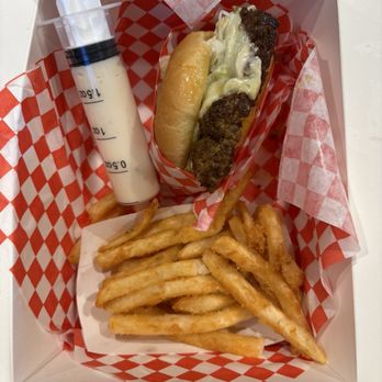 Secret Burger Kitchen Tacoma Smash Burgers - Maharaji Burger with garlic sauce syringe and fries - Burgers Near Me - Tacoma, Washington Secret Burger Kitchen Tacoma Smash Burgers - Maharaji Burger with garlic sauce syringe and fries - Burgers Near Me - Tacoma, Washington