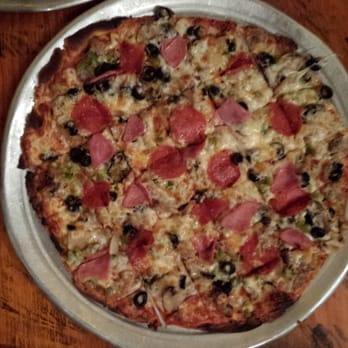 Pizza House - This is the Deluxe with ham.  Great flavor. - Pizza Near Me - Springfield, Missouri