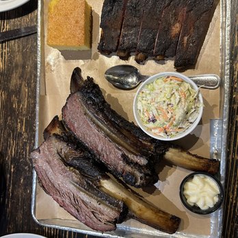 Bludso's BBQ - 2 Dinosaur Beef Ribs, half rack pork ribs, cole slaw cornbread honey butter - Barbeque Near Me - Los Angeles, California Bludso's BBQ - 2 Dinosaur Beef Ribs, half rack pork ribs, cole slaw cornbread honey butter - Barbeque Near Me - Los Angeles, California