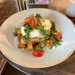 Brick & Beam - SF Avocado Toast:  2 eggs to order over the avocado toast topped with an Arugula salad- all over crispy potatoes.