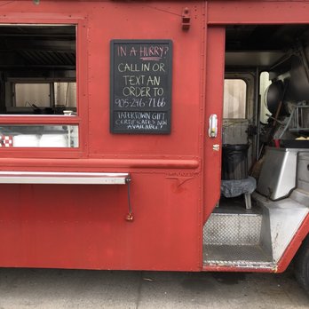 Tater Town - a red food truck with its door open - Food Trucks Near Me - St. Catharines, Ontario