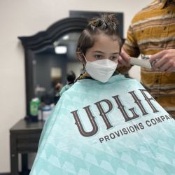 Ivy League Barber Academy - Friendly so far :).  Excited to see what his haircut will look like.