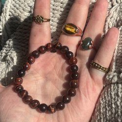 Secret Garden Gifts - All Items featured are from their shop : - Dragon's Eye Bracelet - 2 golden rings - Moss Agate ring  - Tigers Eye Ring