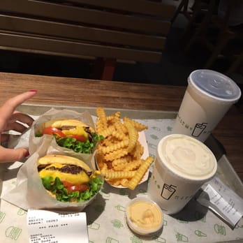 Shake Shack Coral Gables - Single and double burger.  fries house sauce salted caramel shake and large coke - Burgers Near Me - Coral Gables, Florida