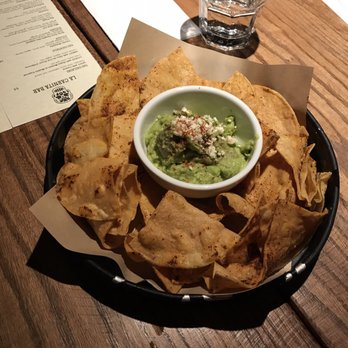 La Carnita - Chips and guac. Definitely get this to share. There's a delicious lime salt they put on these chips which make them super addictive. - Mexican Near Me - Toronto, Ontario La Carnita - Chips and guac. Definitely get this to share. There's a delicious lime salt they put on these chips which make them super addictive. - Mexican Near Me - Toronto, Ontario