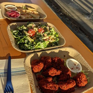 Photo of Wursthall - San Mateo, CA, United States. Hot chicken, salad and kasedilla