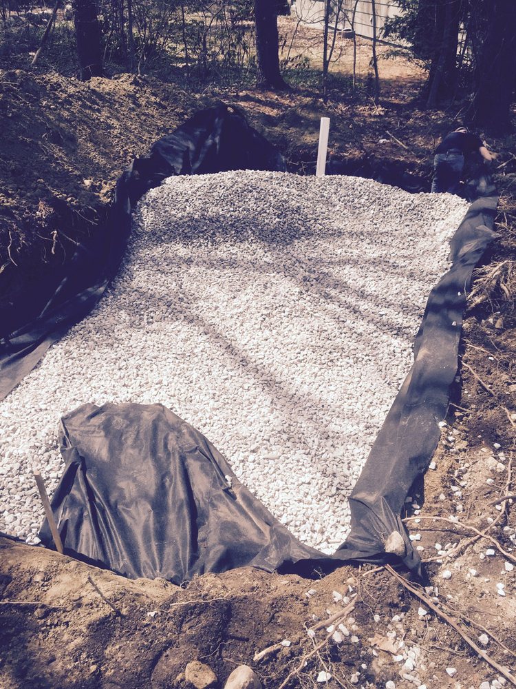 Slide of EmRay Excavating