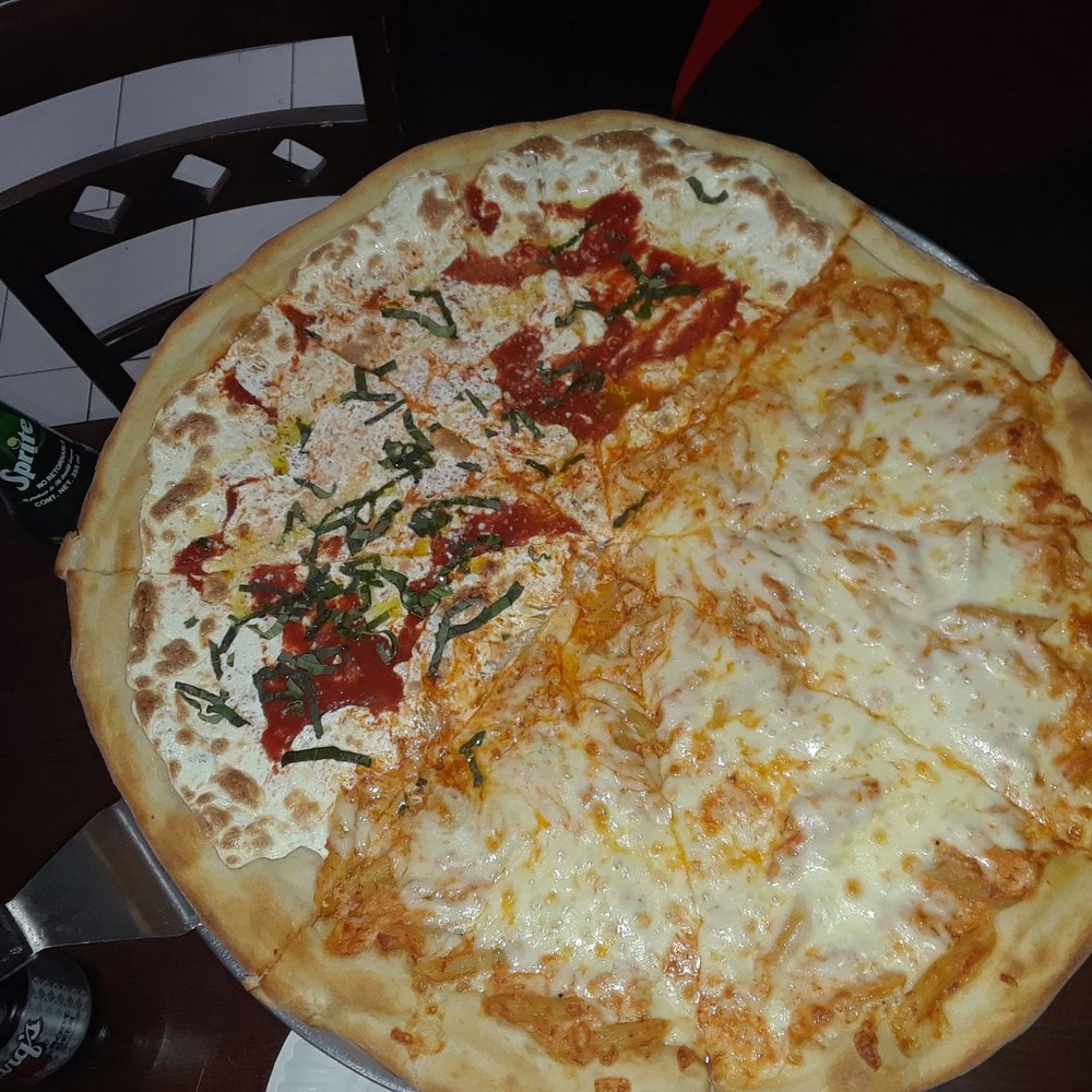 Franco's Pizza - Beware! Large pizza is a whopping 20 inches in diameter!  We got 1/2 baked ziti, the other half margherita pizza with fresh basil!  Awesome! - Italian Near Me - Spring Valley, New York