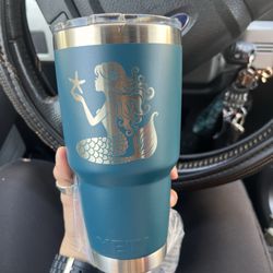 Monarch Trophy Studio - One side of the yeti cup. Mermaid design. Names on the other side.