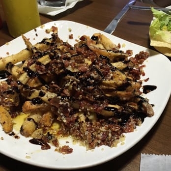 Sweet’s Bar & Grill - Chronic Fries - Pizza Near Me - Honor, Michigan Sweet’s Bar & Grill - Chronic Fries - Pizza Near Me - Honor, Michigan