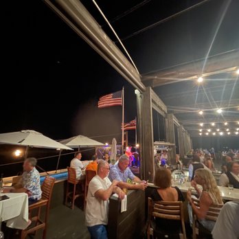 Fleetwood's on Front St - Outdoor upstairs bar and dining facing waterfront - New American Near Me - Lahaina, Hawaii