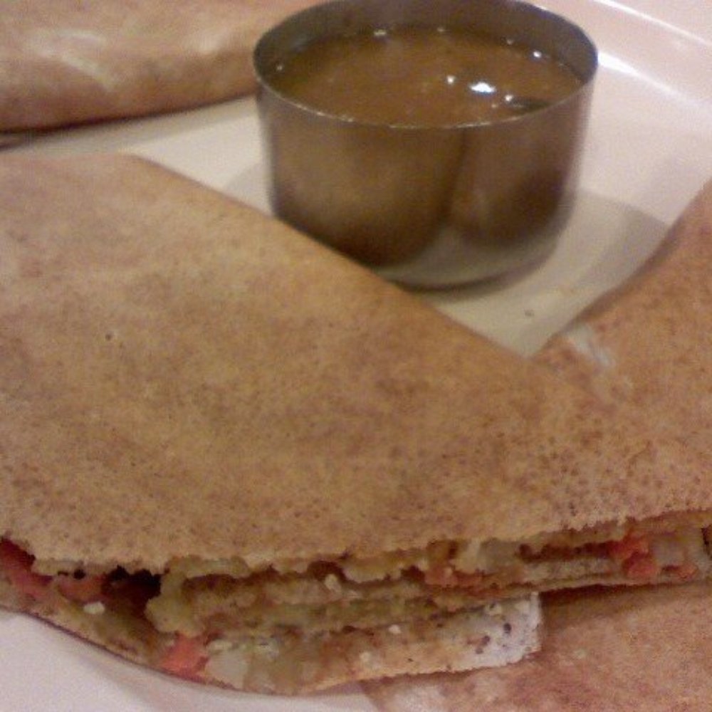 Udupi Indian Vegetarian & Vegan Cuisine - Udupi special spring dosa, as plated, with sambar. - Indian Near Me - Tempe, Arizona Udupi Indian Vegetarian & Vegan Cuisine - Udupi special spring dosa, as plated, with sambar. - Indian Near Me - Tempe, Arizona