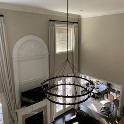 Escarate Electric - 25 ft high 80lb chandelier installation