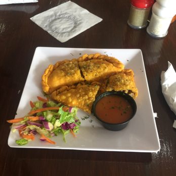 Orozco's - Beef empanadas with sauce. - Puerto Rican Near Me - San Juan, Puerto Rico Orozco's - Beef empanadas with sauce. - Puerto Rican Near Me - San Juan, Puerto Rico