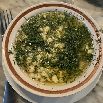 Agi's Counter - NOKEDLI SOUP Grated dumplings swimming in a bowl of chicken broth, finished with loads dill & toasted garlic oil - Hungarian Near Me - Brooklyn, New York