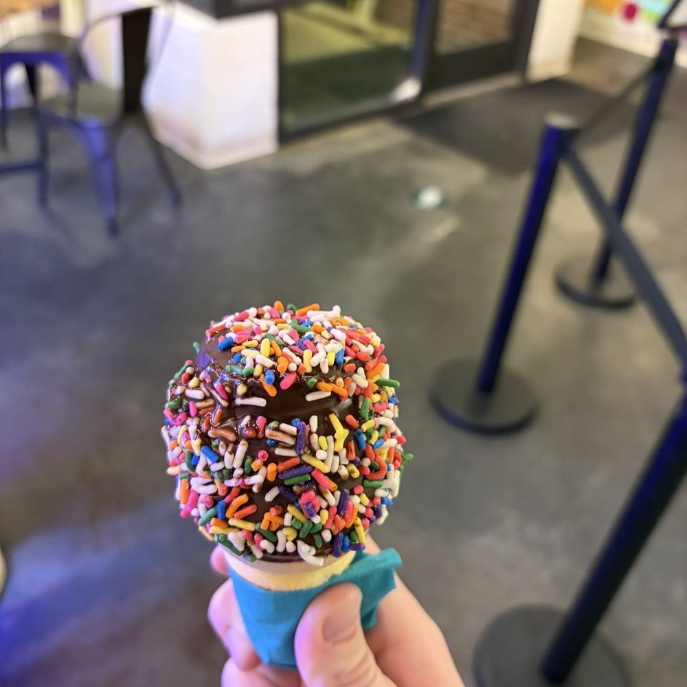 Kid sized cone with peanut butter center , chocolate dip, and sprinkles Kid sized cone with peanut butter center , chocolate dip, and sprinkles