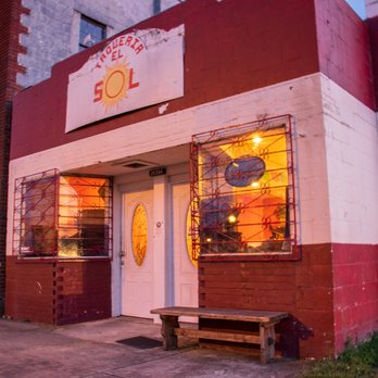 El Sol - a red and white building with a sign that says el sol - Latin American Near Me - Parksley, Virginia El Sol - a red and white building with a sign that says el sol - Latin American Near Me - Parksley, Virginia