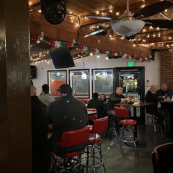 Los Amigos Bar & Grill - The bar area with high top tables