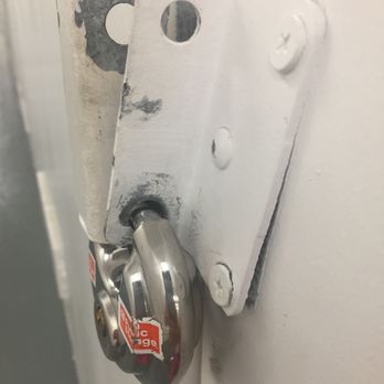 Public Storage - The lock attachment is fastened to the door ON THE OUTSIDE!! Anyone with a screwdriver could unscrew this and your lock would just fall off! - Self Storage Near Me - Torrance, California