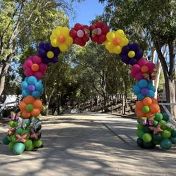 Cabrera's Balloons - 25ft Balloon Flower Arch with butterflies