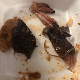 Burnt pieces of pork barbecue sandwich Burnt pieces of pork barbecue sandwich